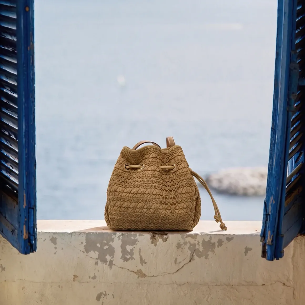 Borsa a secchiello beige Donna effetto crochet e coulisse Lora Ferres