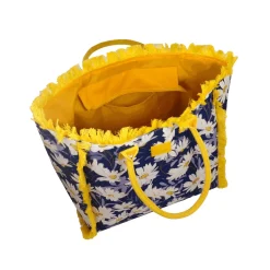Borsa mare blu con fiori e frange gialle da Donna Camomilla Milano