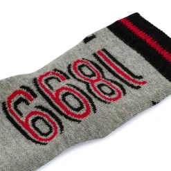 Calzini antiscivolo grigi da bambino con logo Milan
