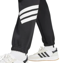 Pantaloni sportivi da donna neri con maxi strisce bianche adidas