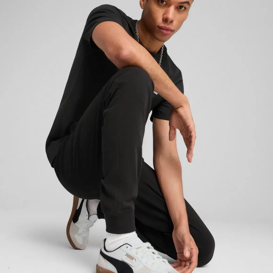 Pantaloni sportivi da uomo neri Puma con logo e polsini alle caviglie