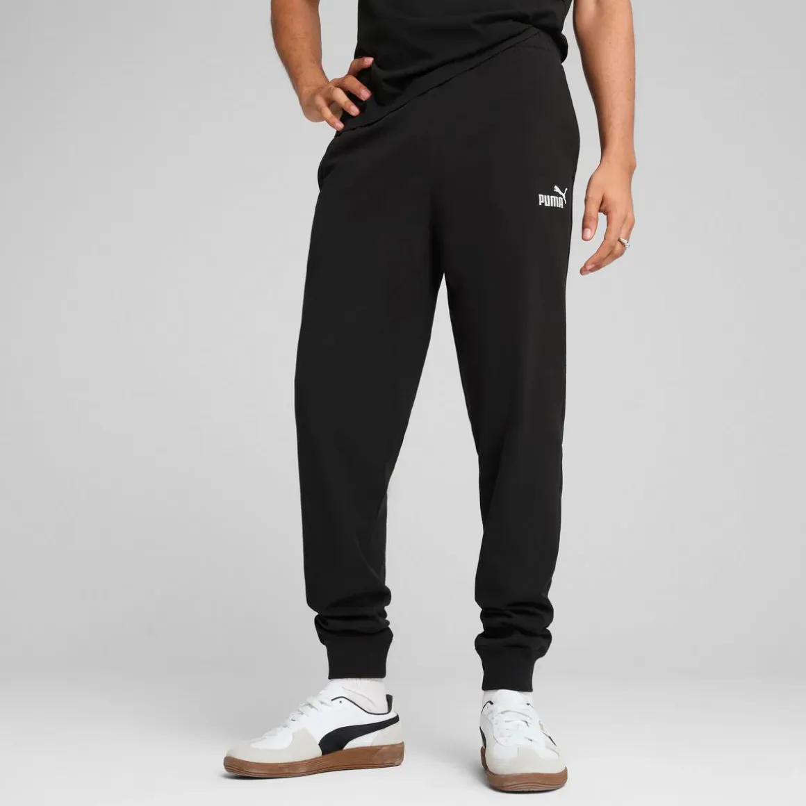 Pantaloni sportivi da uomo neri Puma con logo e polsini alle caviglie