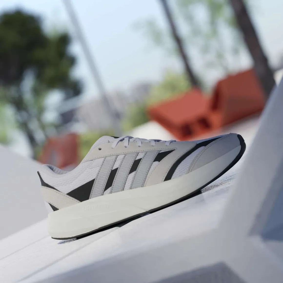 Scarpe bianche da uomo con suola ammortizzata adidas LIGHTSHIFT 2.0
