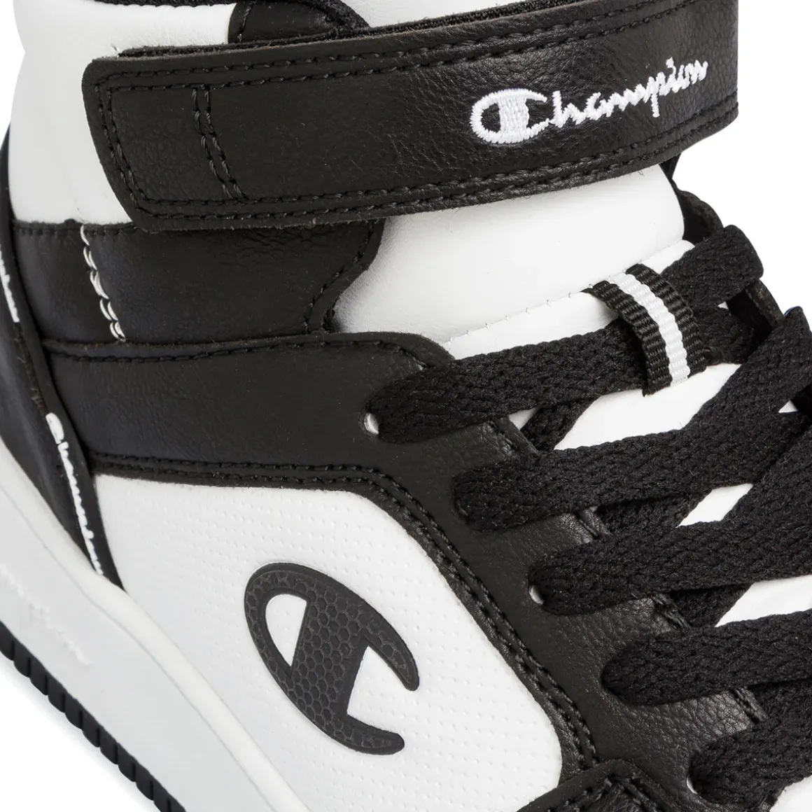 Sneakers alte da ragazzo bianche e nere con logo Champion Rebound 2.0 Mid