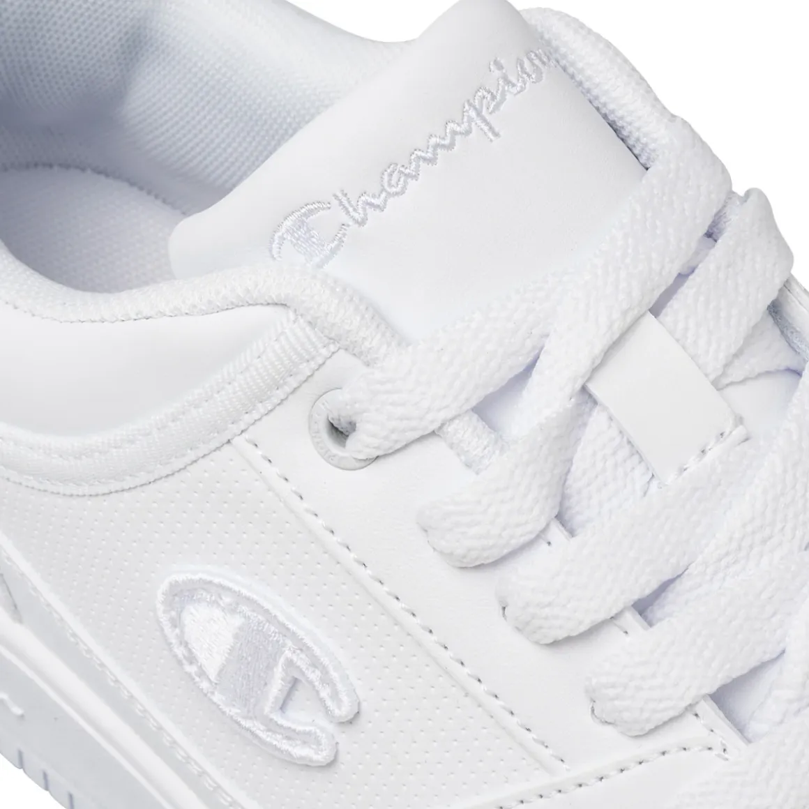 Sneakers bianche da uomo con logo laterale Champion Rebound Low