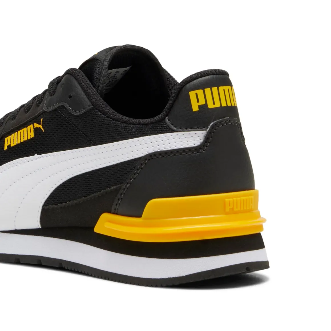 Sneakers da ragazzo nere con dettagli gialli Puma Runner V4