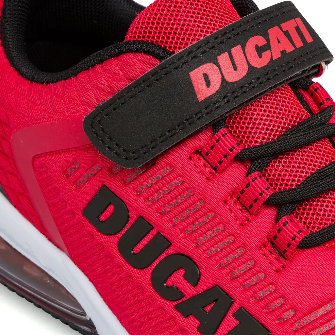 Sneakers rosse da bambino con ammortizzazione aad aria Ducati