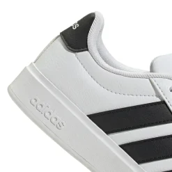 Sneakers sport da ragazzo bianche con dettagli neri adidas STREETTAL