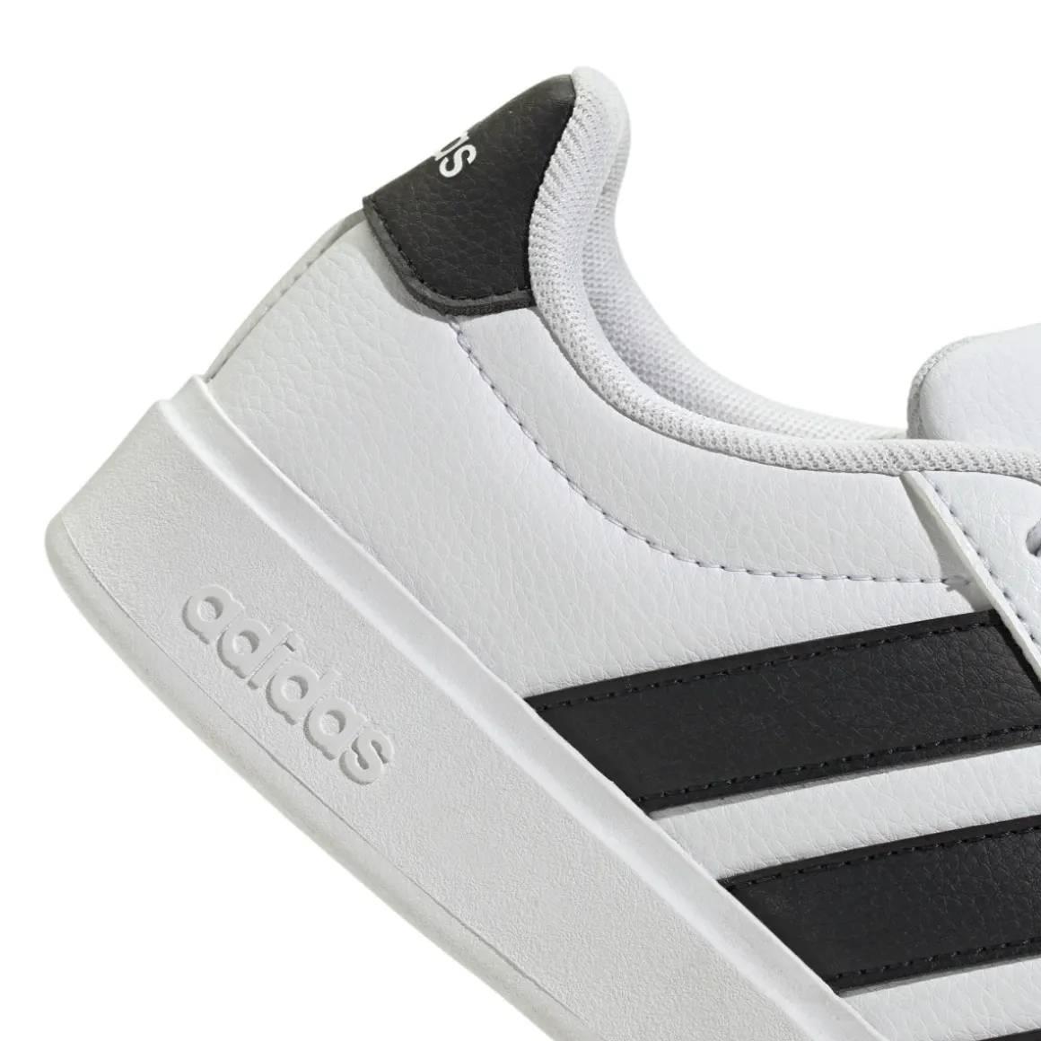 Sneakers sport da ragazzo bianche con dettagli neri adidas STREETTAL