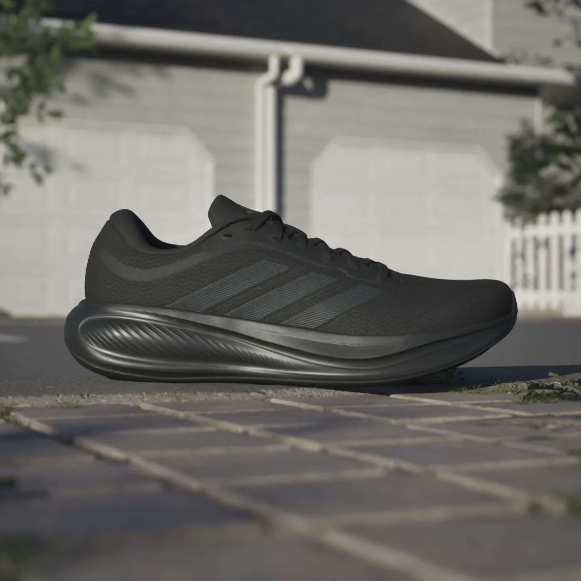 Sneakers Unisex nere in mesh traspirante adidas RESPONSE RUNNER 2
