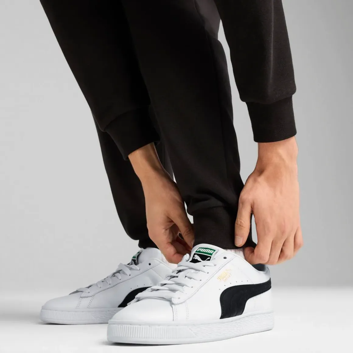 Tuta completo coordinato da uomo nero con logo e zip intera Puma