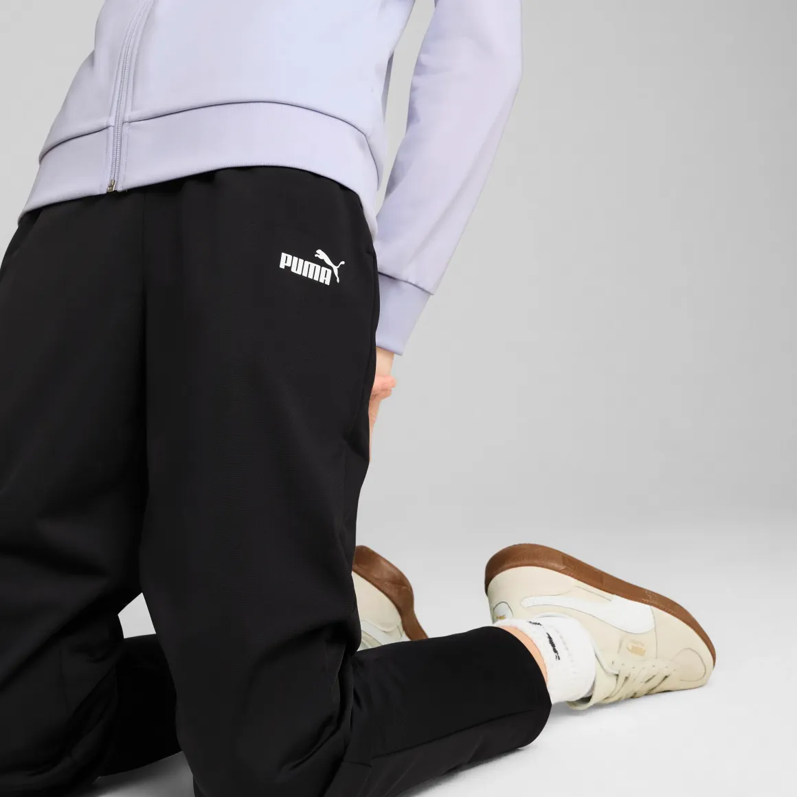Tuta sportiva nera da Donna con zip Poly Suit Puma